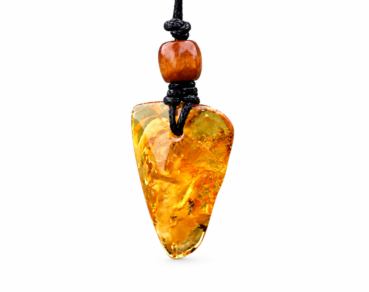 A unique Baltic amber amulet pendant featuring a fascinating insect inclusion