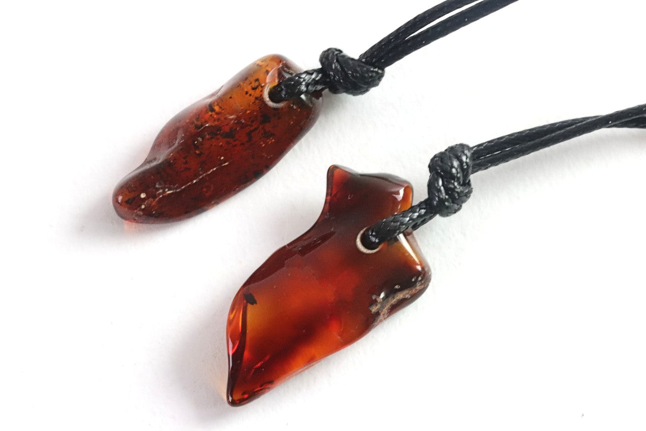 Set of 2 Polished Baltic Amber Amulet Pendants