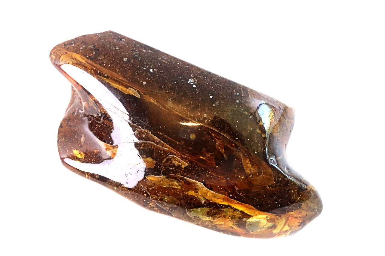 Large crystal with brownish tint on a white background