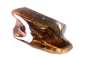 Large crystal with brownish tint on a white background