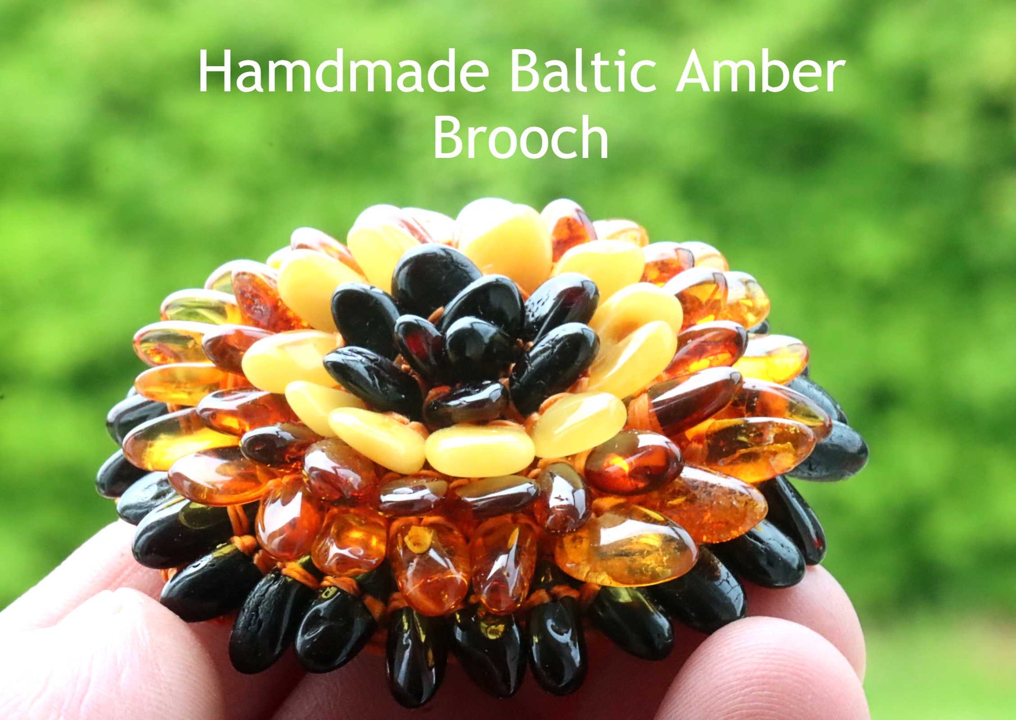 Coloured amber beads set in flower shape