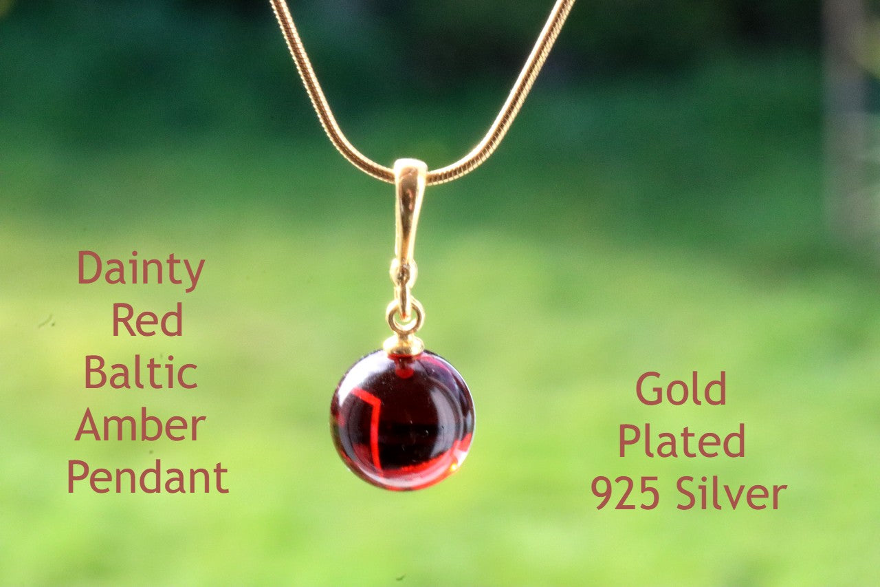 Ingdrop Red Add warmth and luxury with this Red Drop Pendant Amber SOS red drop pendant