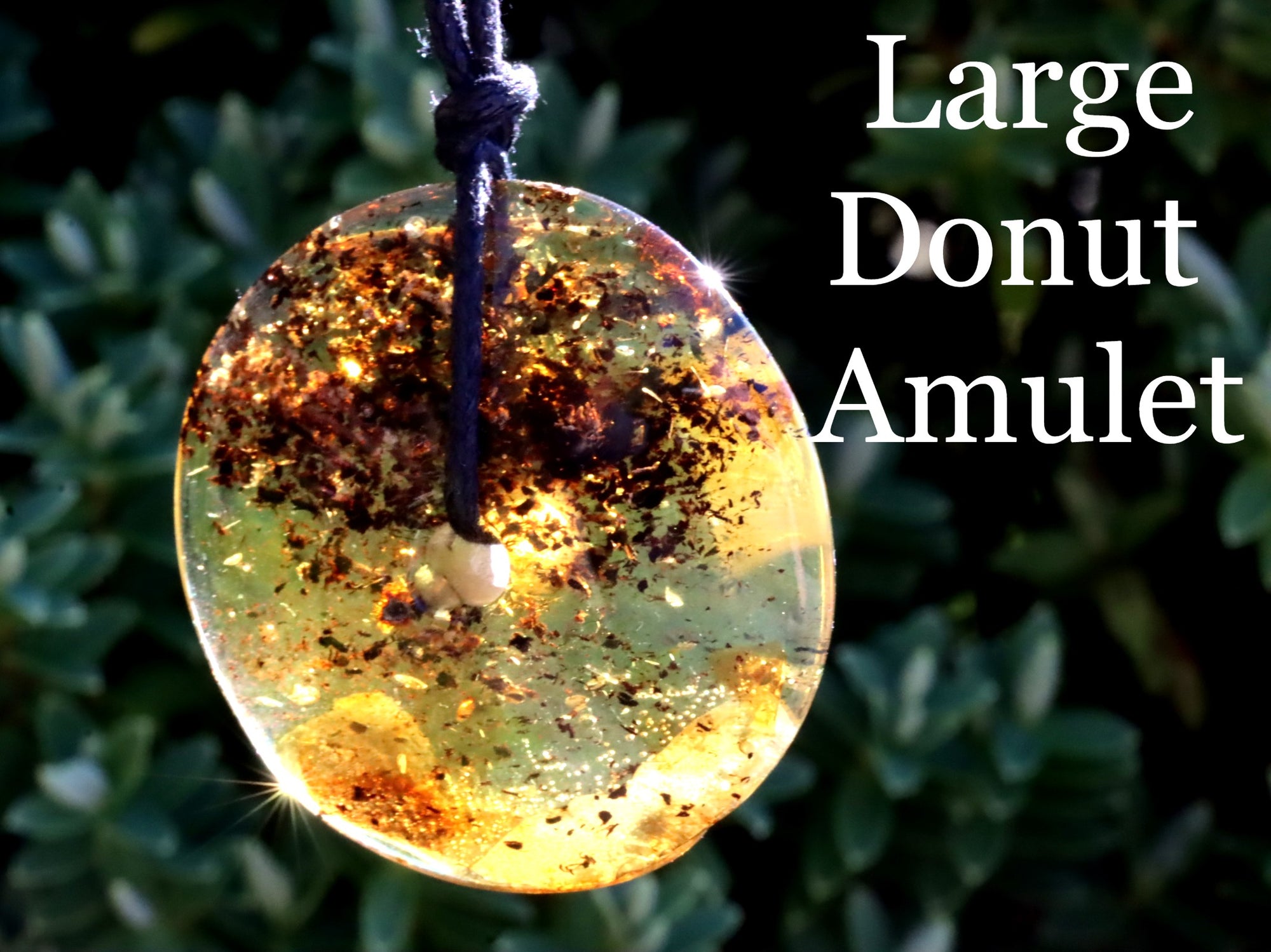 Large Baltic Amber Donut Amulet Pendant