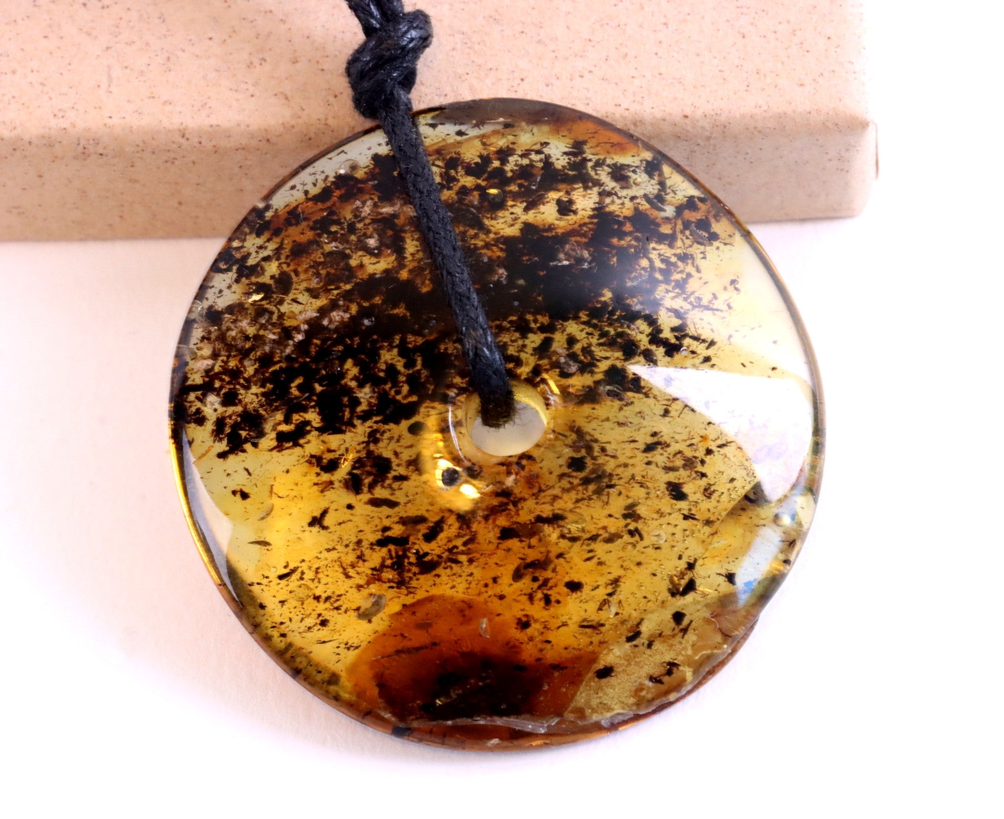 Large Baltic Amber Donut Amulet Pendant