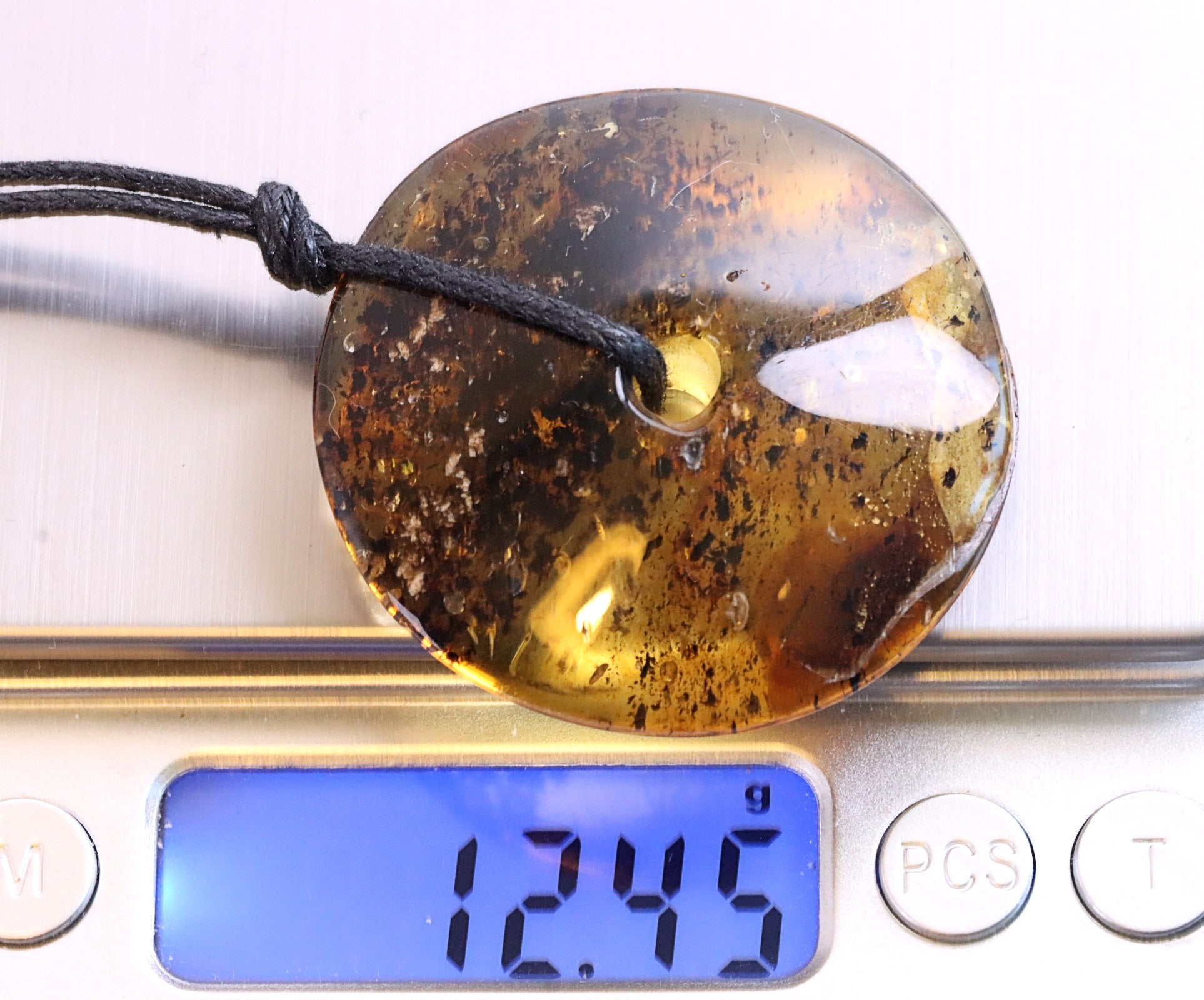 Large Baltic Amber Donut Amulet Pendant