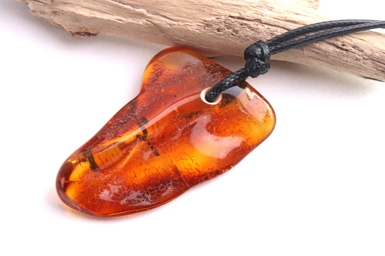 Amber Amulet with Natural Fossilised Tree Branch Inclusion