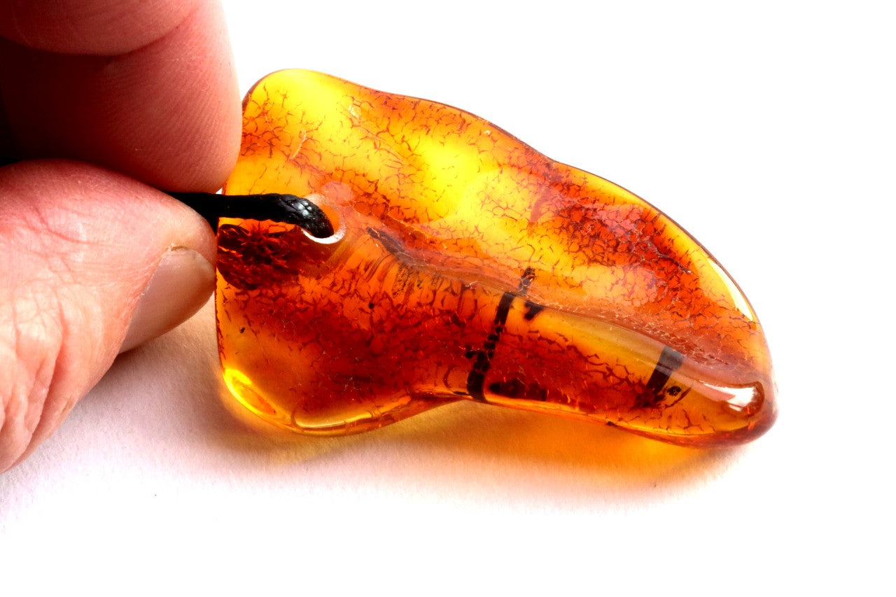 Amber Amulet with Natural Fossilised Tree Branch Inclusion