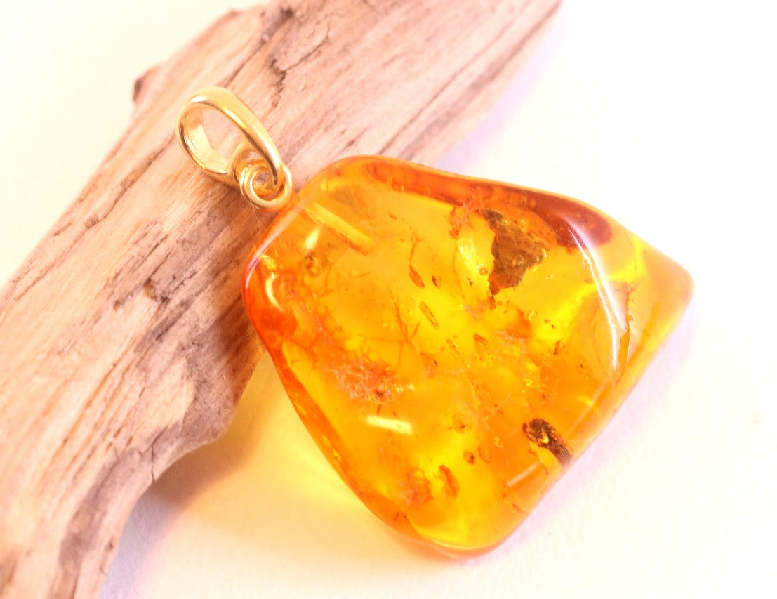 Golden Amber Pendant with Insect