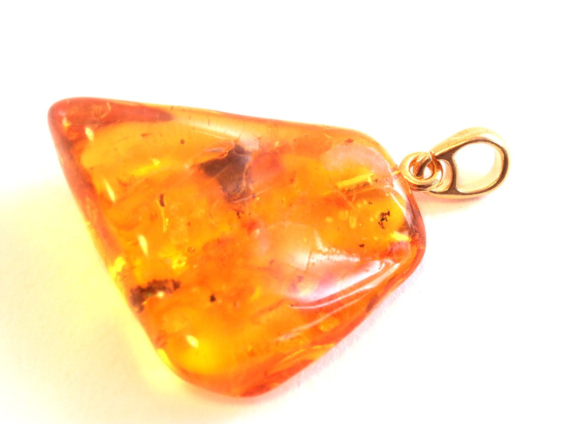 Golden Amber Pendant with Insect