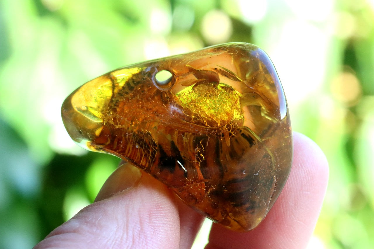 Natural Amber Gemstone with a Natural Hole