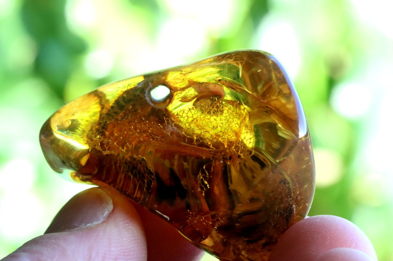 Natural Amber Gemstone with a Natural Hole