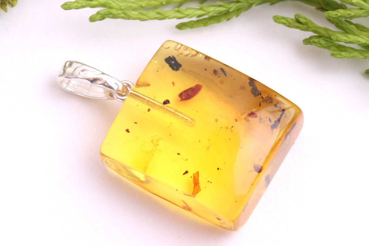 Clear Amber Pendant with Visible Inclusion