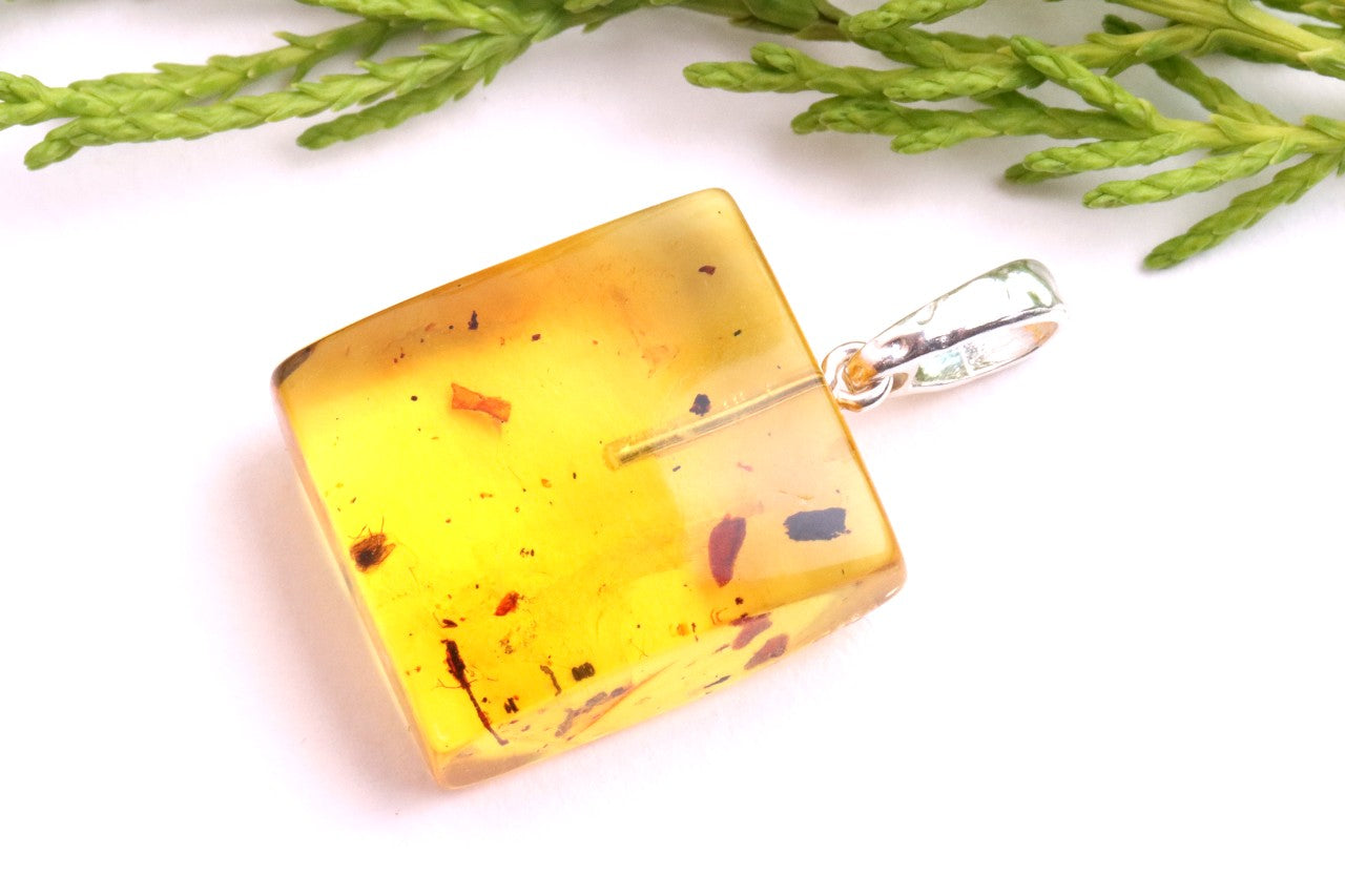 Clear Amber Pendant with Visible Inclusion