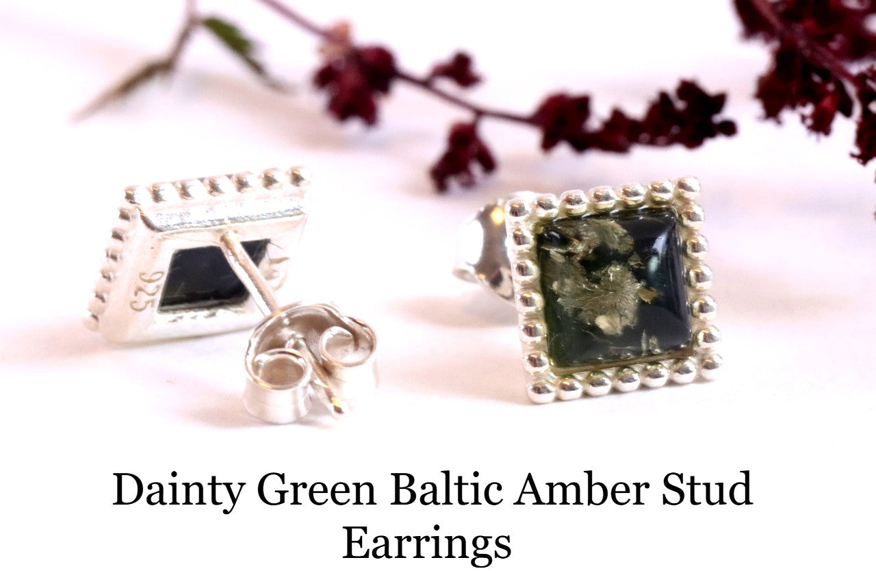 Dainty green amber stud earrings on a white background with text.