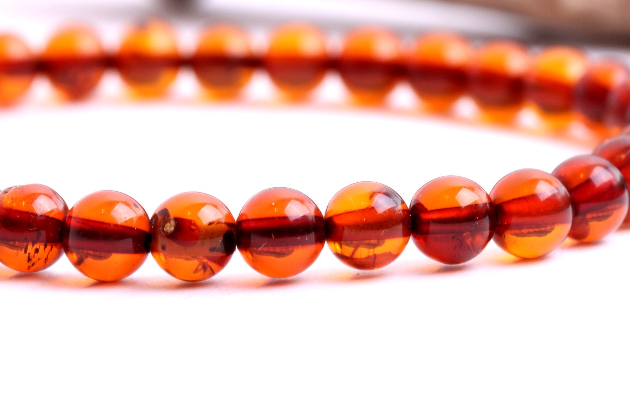 Perfect Round warm red Baltic amber bracelet.
