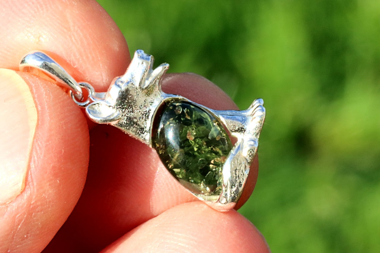 Sterling Silver Dog Pendant with Green Baltic Amber