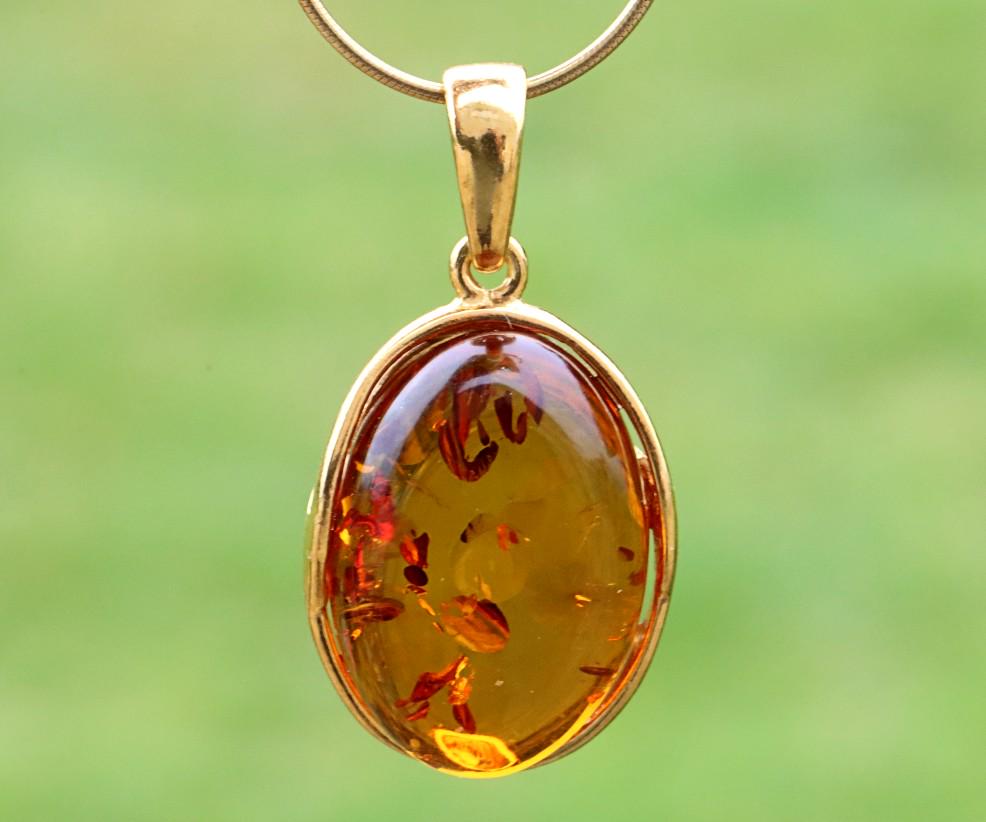Oval Baltic Amber Pendant on Gold Plated Sterling Silver