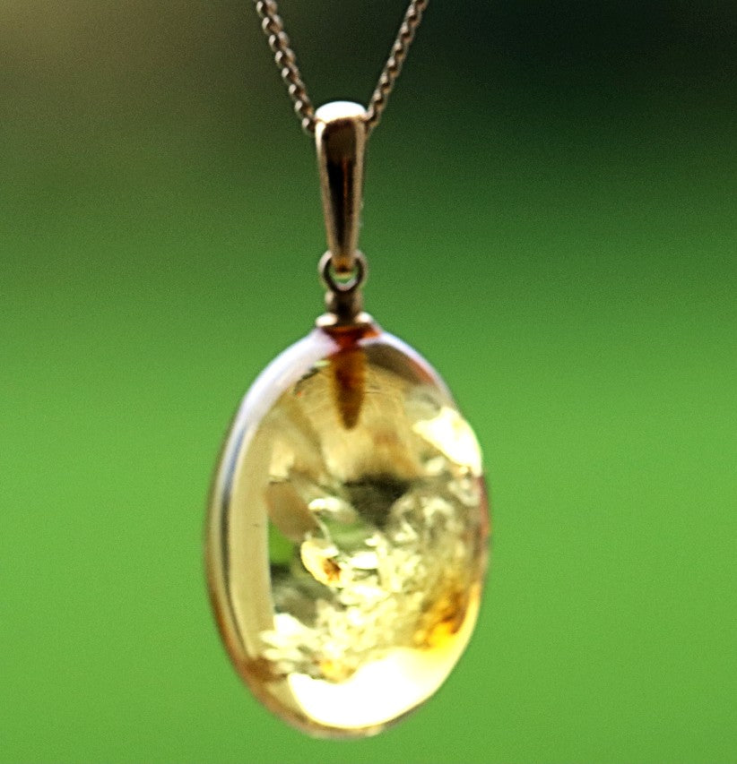 A best seller only one left Baltic Amber Drop Pendant on 925 Gold-Plated Silver