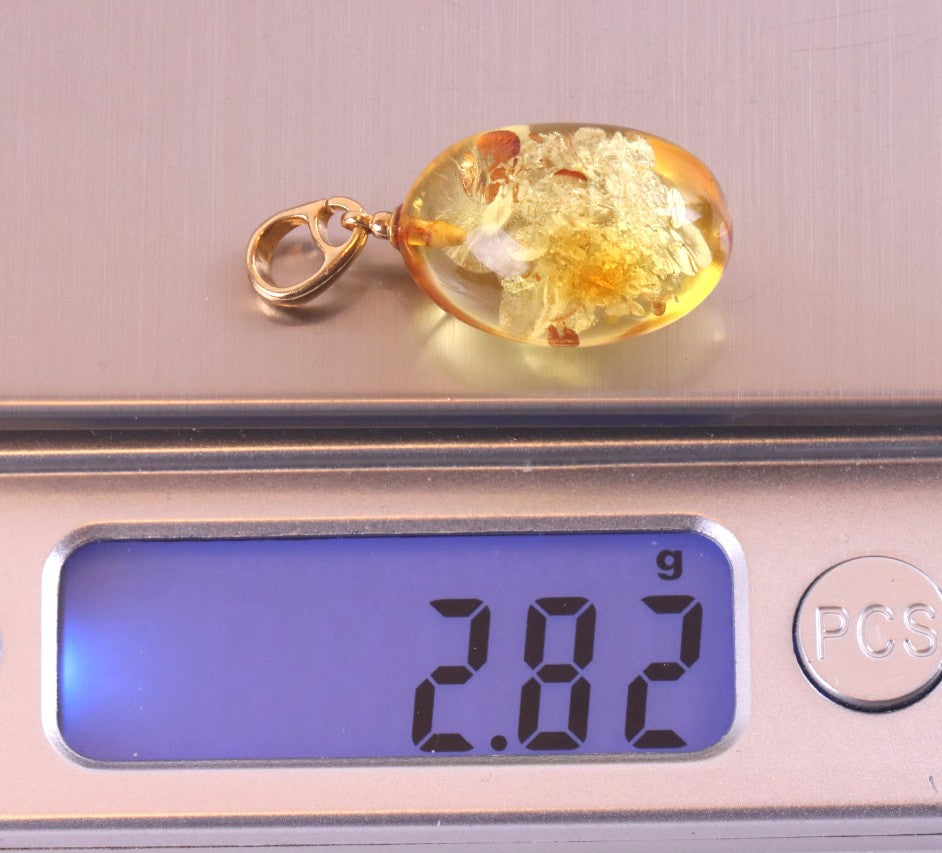 A best seller only one left Baltic Amber Drop Pendant on 925 Gold-Plated Silver