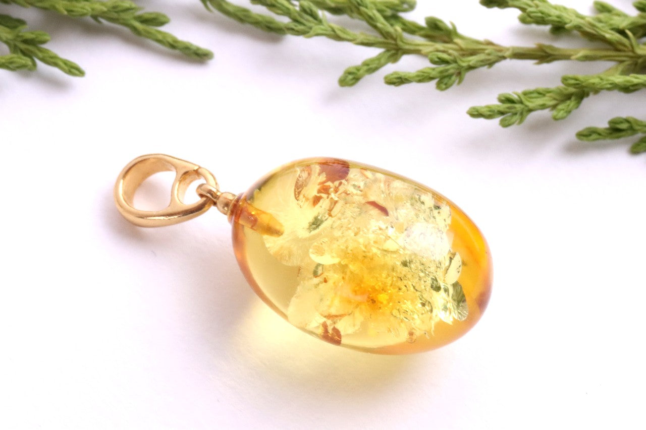 A best seller only one left Baltic Amber Drop Pendant on 925 Gold-Plated Silver