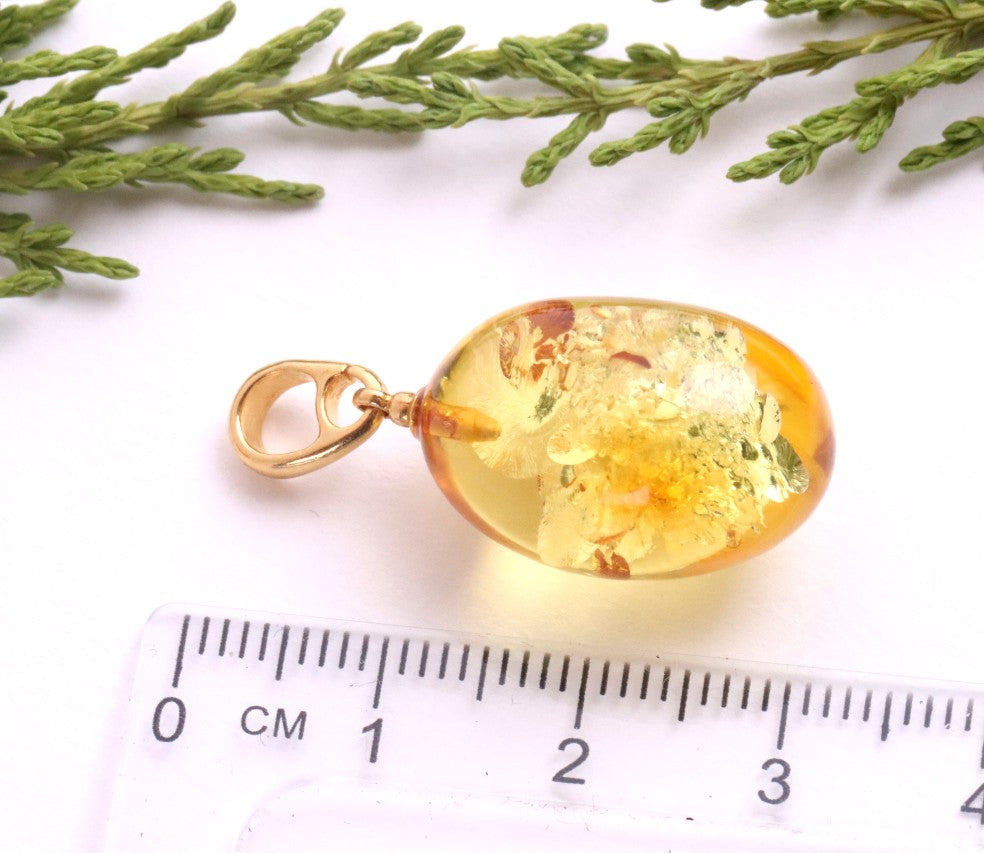 A best seller only one left Baltic Amber Drop Pendant on 925 Gold-Plated Silver