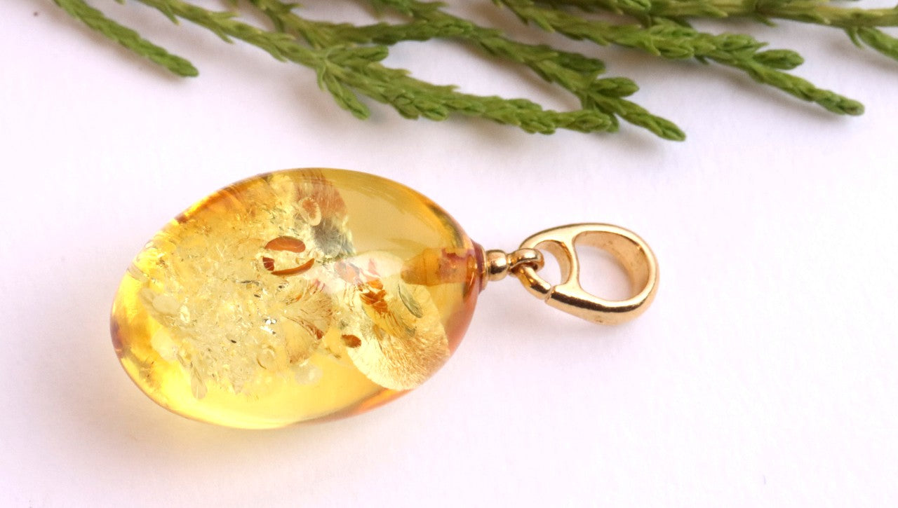 A best seller only one left Baltic Amber Drop Pendant on 925 Gold-Plated Silver