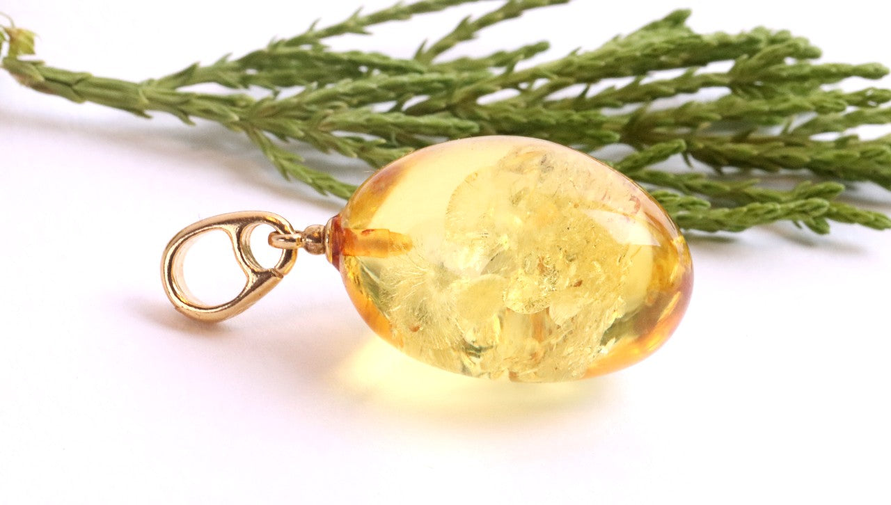 A best seller only one left Baltic Amber Drop Pendant on 925 Gold-Plated Silver