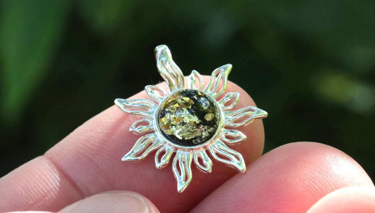 Radiant Sun Pendant – 925 Sterling Silver with Green Baltic Amber