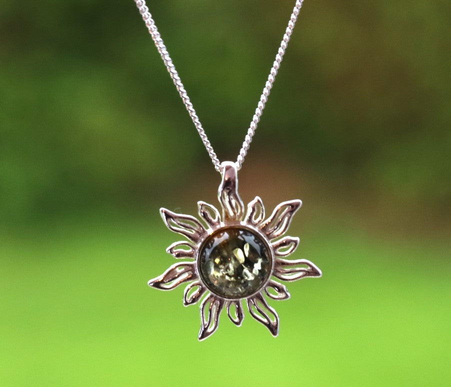 Radiant Sun Pendant – 925 Sterling Silver with Green Baltic Amber