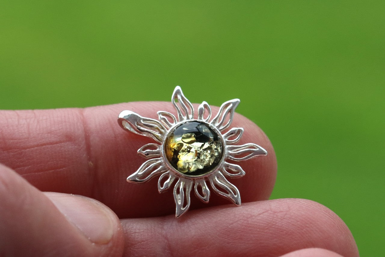 Radiant Sun Pendant – 925 Sterling Silver with Green Baltic Amber
