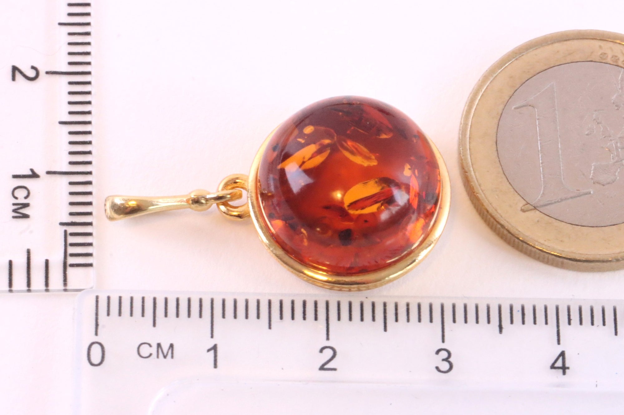 pendant with ruler