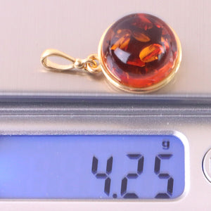 pendant on scales