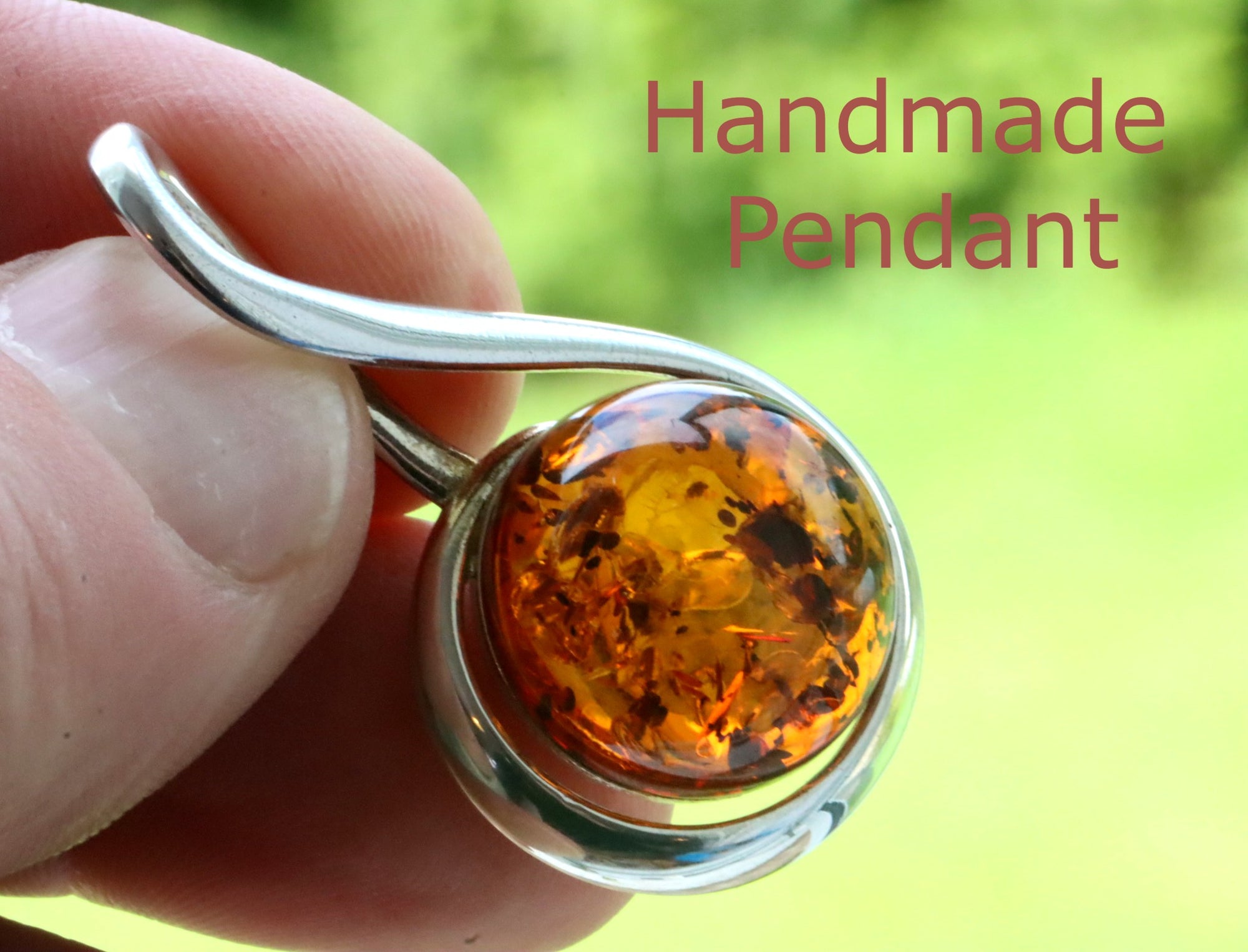 Quality Silver Circle Pendant with Honey Baltic Amber Gemstone