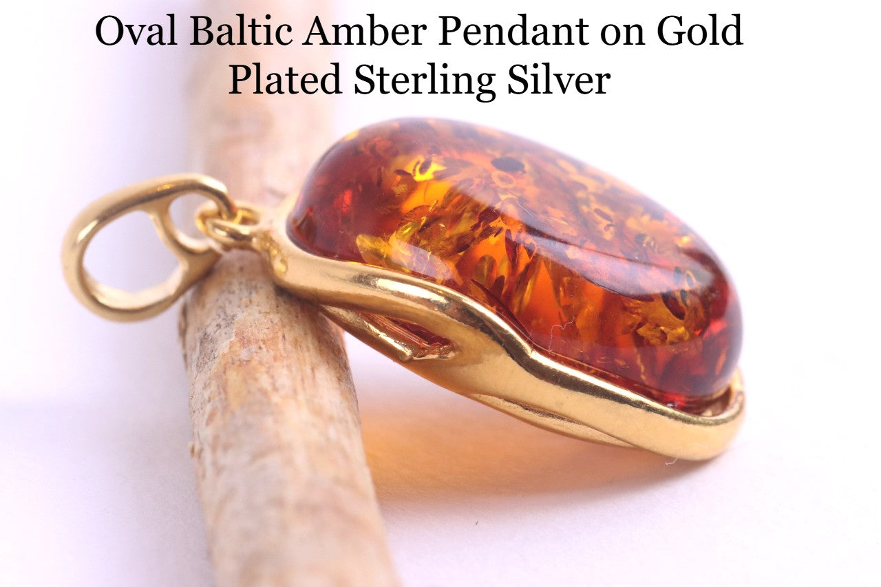Oval Baltic Amber Pendant on Gold Plated Sterling Silver