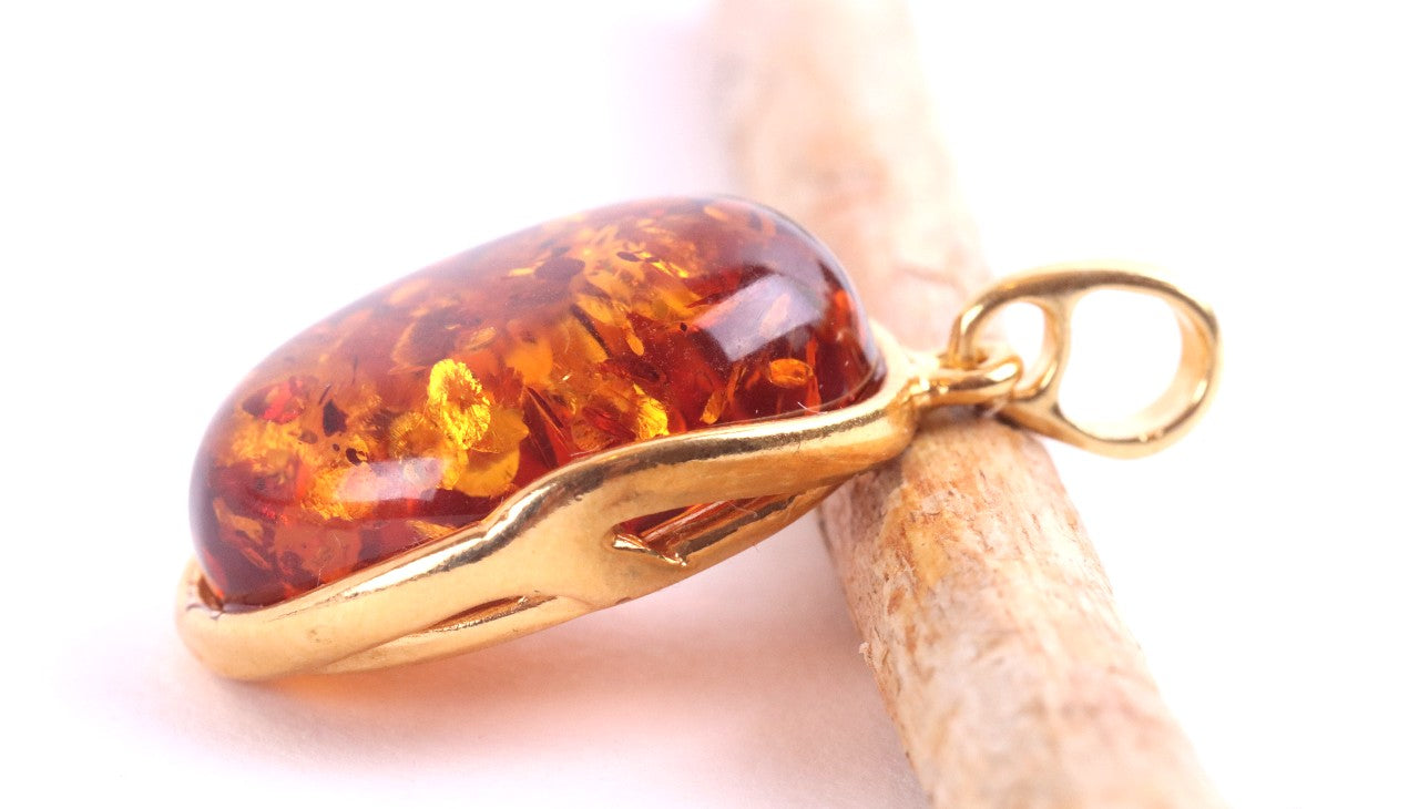 Oval Baltic Amber Pendant on Gold Plated Sterling Silver