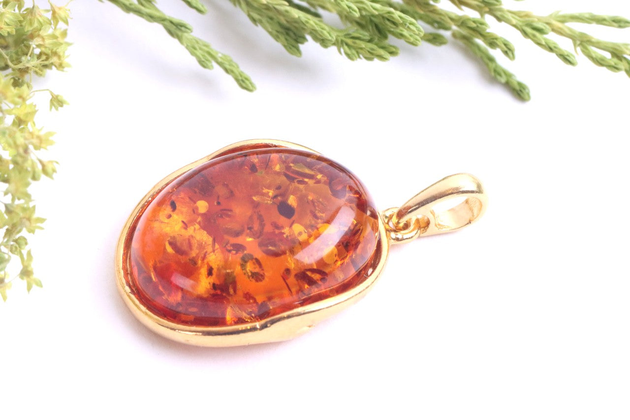 Oval Baltic Amber Pendant on Gold Plated Sterling Silver