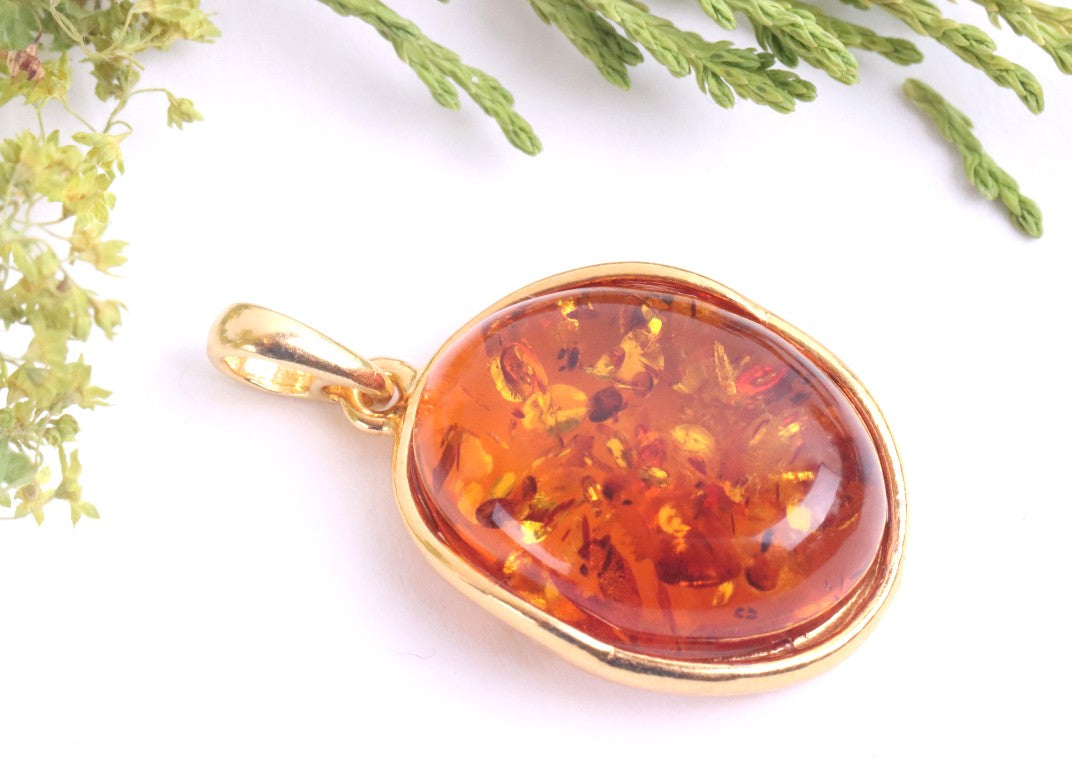 Oval Baltic Amber Pendant on Gold Plated Sterling Silver