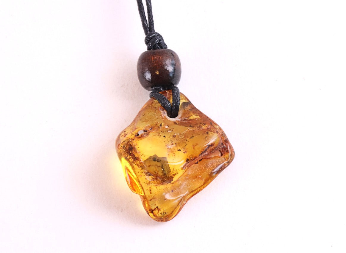 Unique Baltic Amber Amulet with Wooden Bead