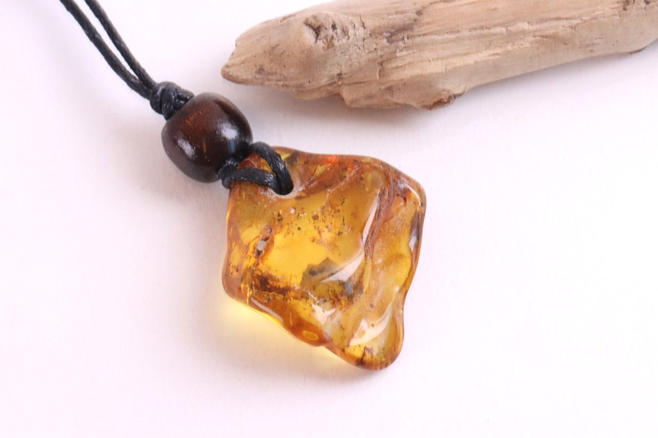 Unique Baltic Amber Amulet with Wooden Bead