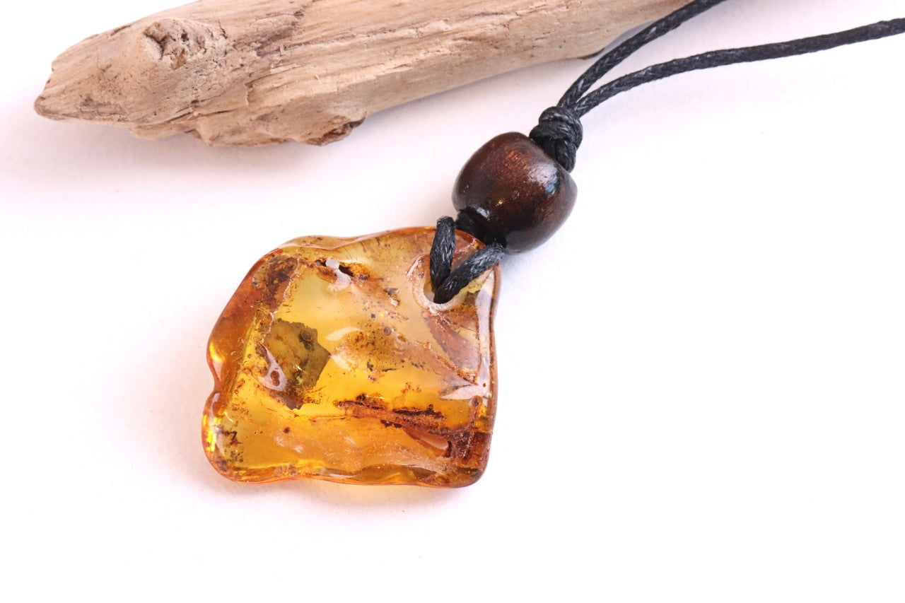 Unique Baltic Amber Amulet with Wooden Bead
