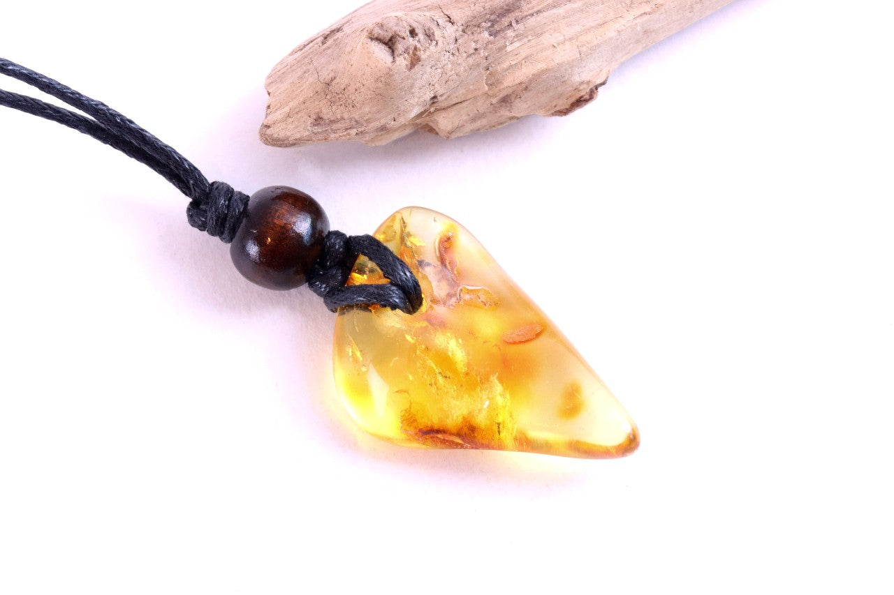 Unique Baltic Amber Amulet with Wooden Bead
