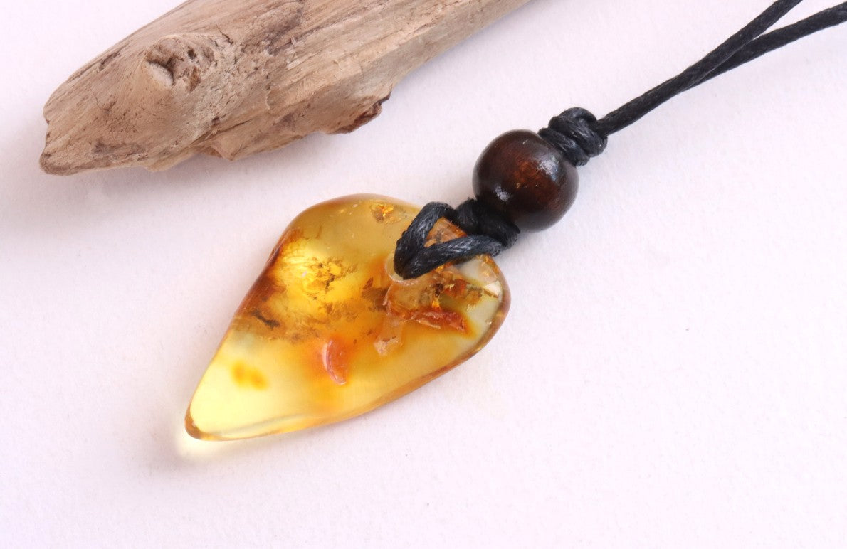 Unique Baltic Amber Amulet with Wooden Bead
