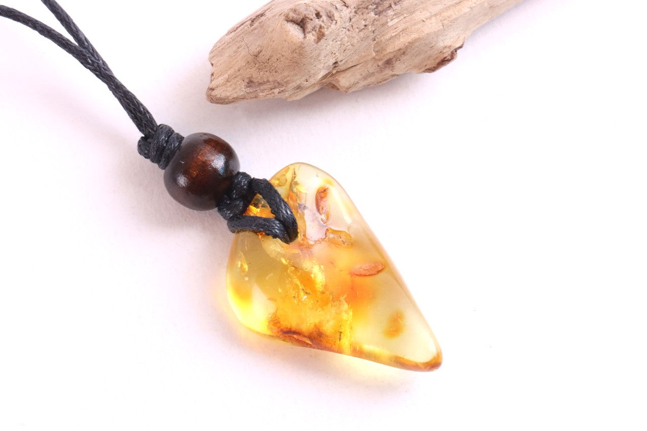 Unique Baltic Amber Amulet with Wooden Bead