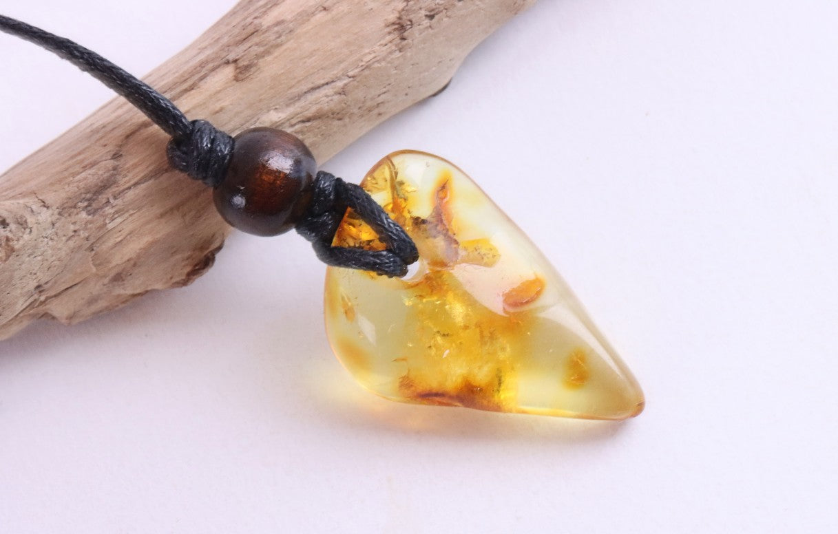 Unique Baltic Amber Amulet with Wooden Bead