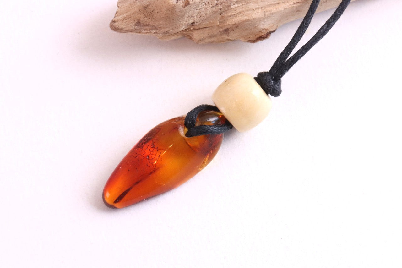 Unique Baltic Amber Amulet with Wooden Bead