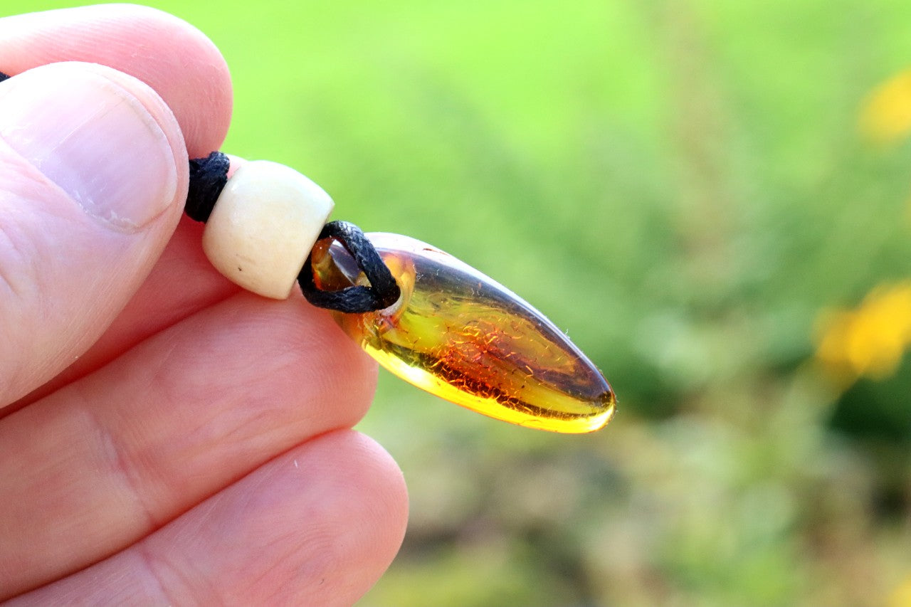 Unique Baltic Amber Amulet with Wooden Bead