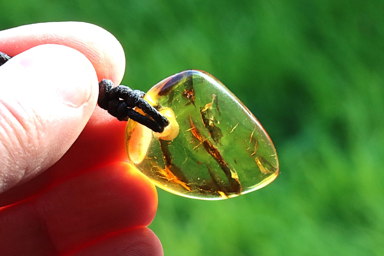 Baltic Amber Amulet, Carry the sun’s warmth and nature’s power wherever you go.