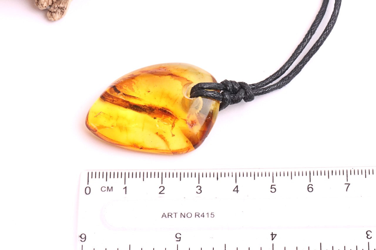 Baltic Amber Amulet, Carry the sun’s warmth and nature’s power wherever you go.