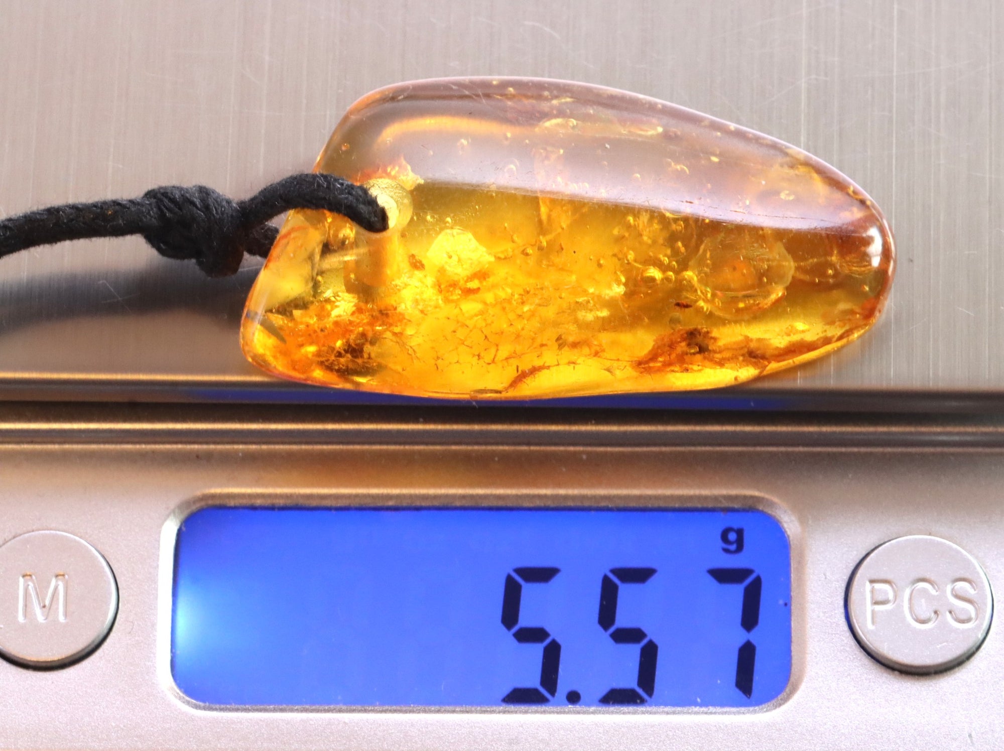 40 million year old Natural Amber Amulet With insectInclusion