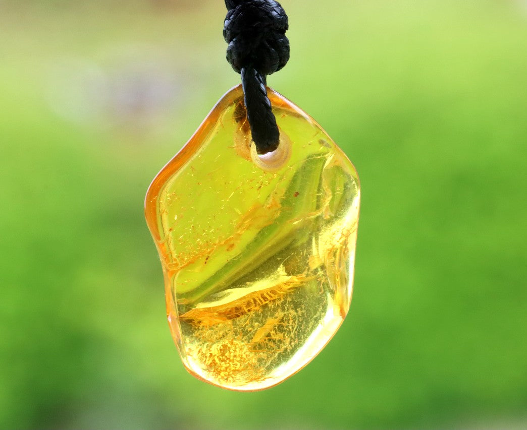 Baltic Amber Amulet with Inlusions
